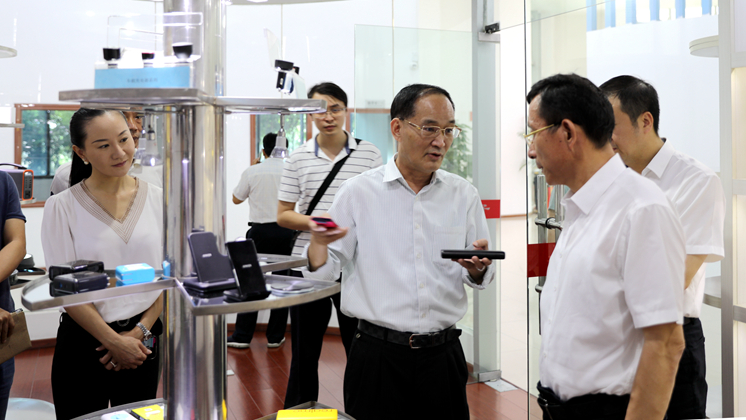 市委常委、市委統戰部部長歐陽鋒調研炬神電子